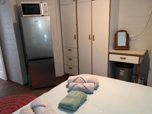 Cama o camas de una habitación en Old Cape on The Marina - The flamingo : unit 8