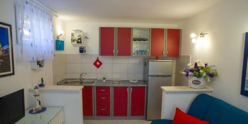 Kuchyň nebo kuchyňský kout v ubytování Apartment Mirjana