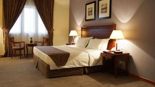 
Ein Bett oder Betten in einem Zimmer der Unterkunft Executives Hotel - Olaya
