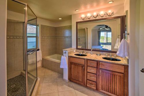 a bathroom with two sinks and a shower at Waimea Condo Less Than 1 Mile from Mauna Lani Beach Club! in Waikoloa