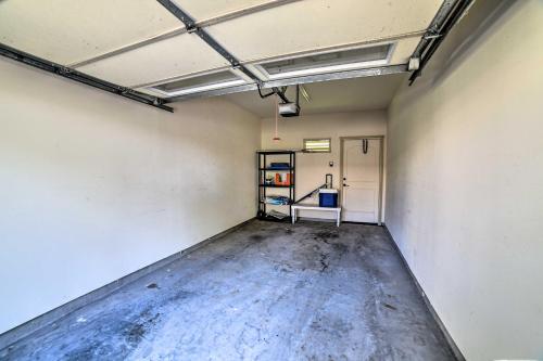 an empty room with a metal shelf in a building at Waimea Condo Less Than 1 Mile from Mauna Lani Beach Club! in Waikoloa
