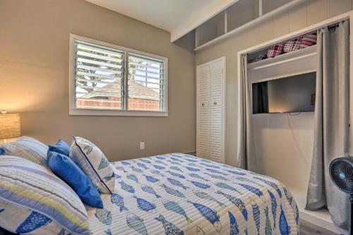 a bedroom with a bed and a window at WFH in Paradise Beachfront Hauula Getaway! in Laie