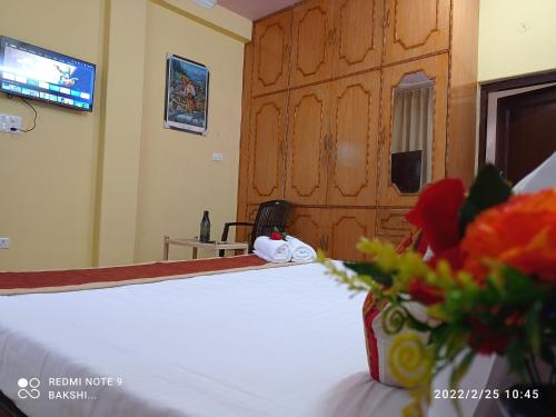 TV a/nebo společenská místnost v ubytování Bakshi Home Stay