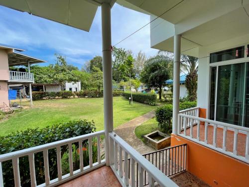 a view from the front porch of a house at Sabai Beach Resort in Ko Mak