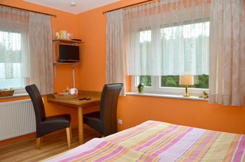 TV a/nebo společenská místnost v ubytování B&B Brandholz