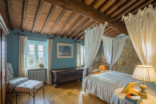 Een bed of bedden in een kamer bij Casale degli Olmi