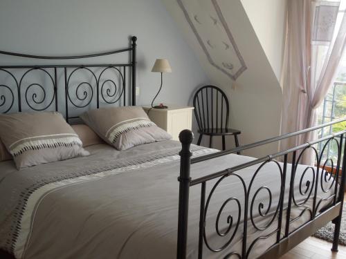 A bed or beds in a room at Belle vue sur mer