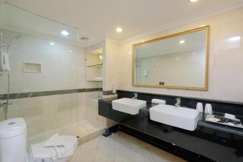 Koupelna v ubytování Metro Park View Hotel Kota Lama Semarang