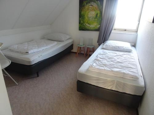 Postel nebo postele na pokoji v ubytování Kustverhuur, Park Scheldeveste, Zwin 005