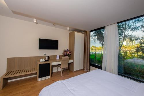 TV a/nebo společenská místnost v ubytování Marina Premium Hotel & Apartments