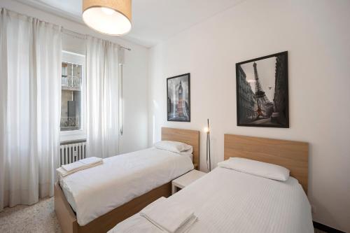 Giường trong phòng chung tại Appartamento Osteria Consani