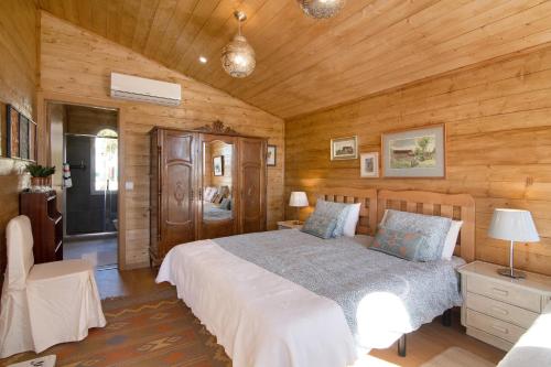 Säng eller sängar i ett rum på Cabana Gardenhouse