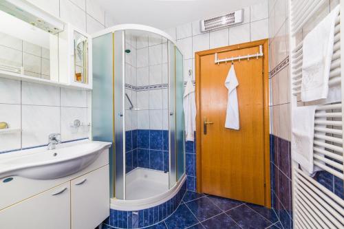 Ванная комната в Villa Apartments Olivetum