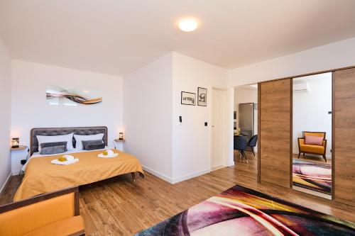 Ένα ή περισσότερα κρεβάτια σε δωμάτιο στο Apartment Evening Star