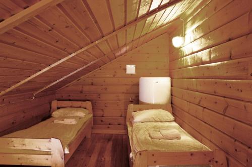 Postel nebo postele na pokoji v ubytování Topcamp Havblikk - Helgeland