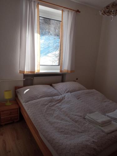 Кровать или кровати в номере Apartmány Božka