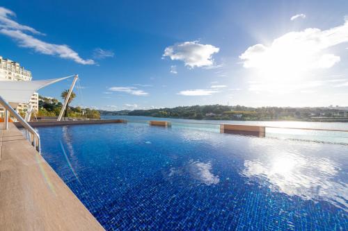 a swimming pool on the side of a building at Pestana Douro Riverside - Preferred Hotels & Resorts, Lifestyle in Porto