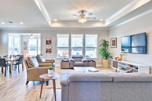a living room with a couch and a table at Sun City House with Fire Pit in 55 and Over Comm! in Georgetown