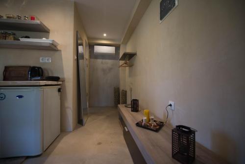 Η κουζίνα ή μικρή κουζίνα στο Sinanis Garden House