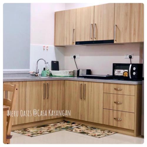 Кухня или мини-кухня в Meru Oasis at Casa Kayangan Ipoh
