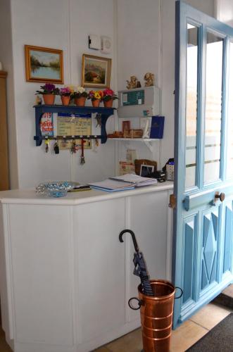 A kitchen or kitchenette at Aux Lys d'Or