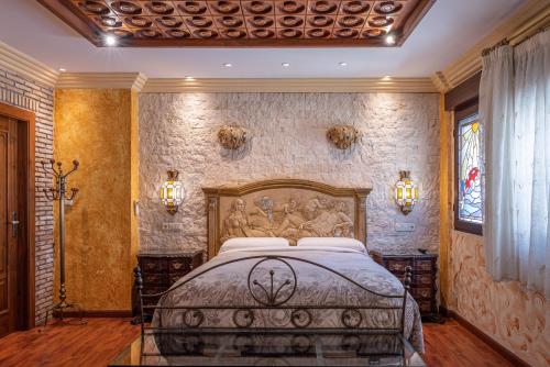 Una cama o camas en una habitación de Casa de Reyes