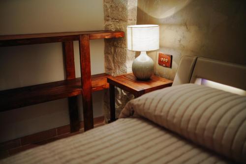 Krevet ili kreveti u jedinici u okviru objekta Square - Suite Santeramo