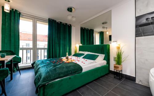 Posteľ alebo postele v izbe v ubytovaní Apartament Lipowa Love Rooms
