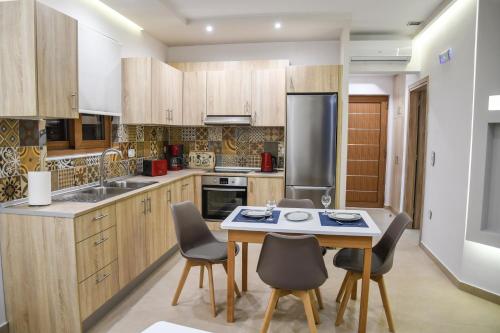 Gambar di galeri bagi Seaside Luxury Apartments Kremasti di Kremastí