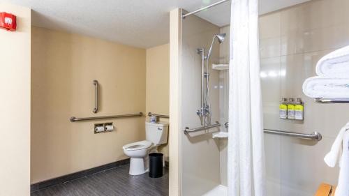 a bathroom with a toilet and a shower at Holiday Inn Express Boise Downtown by IHG in Boise