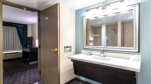 a bathroom with a sink and a mirror at Holiday Inn Express Boise Downtown by IHG in Boise