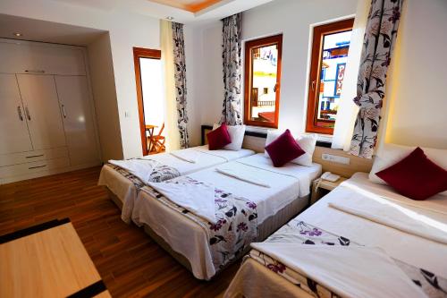 Кровать или кровати в номере Hotel Hermes