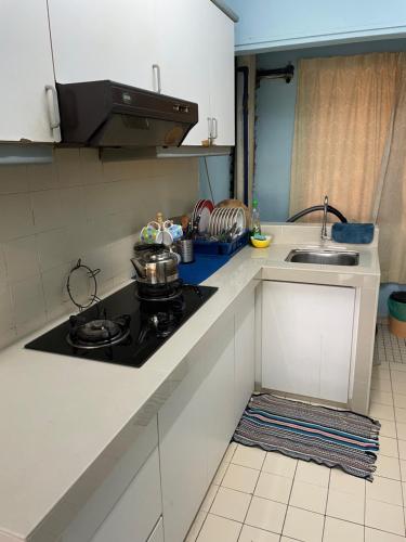 Η κουζίνα ή μικρή κουζίνα στο Subang Ville Ehsan Apartment