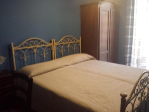 a bedroom with a bed and a window at Bed And Breakfast Marina d'Aspra in Bagheria