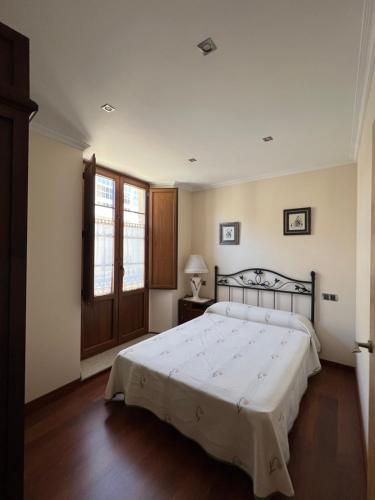 Posteľ alebo postele v izbe v ubytovaní Apartamento Vila O Valadouro 2