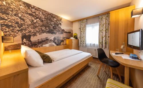 Postelja oz. postelje v sobi nastanitve Hotel Grüner Baum