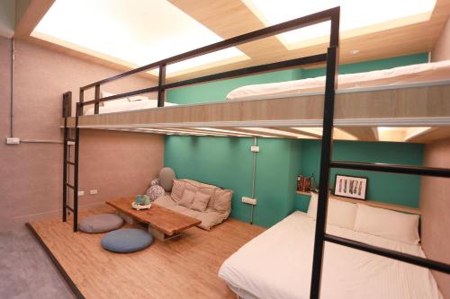 Postel nebo postele na pokoji v ubytování BIRD series B&B&Hostel複合式民宿#本國旅客須先匯款