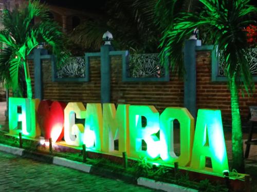 a sign that says the wordiversary in front of a building at Pousada Boutique Recanto Do Encanto - GAMBOA - Morro de São Paulo in Morro de São Paulo