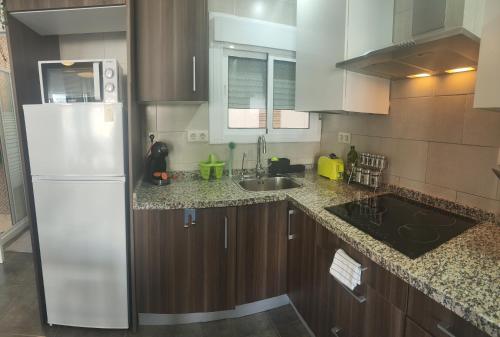 Una cocina o zona de cocina en Casa Bella Apartment