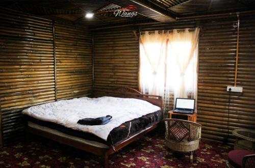 Postel nebo postele na pokoji v ubytování Spring Brooks Homestay