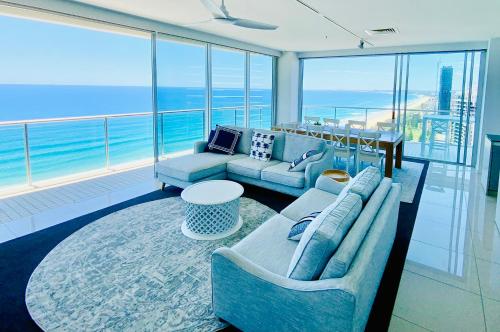 a living room with a view of the ocean at Air on Broadbeach Beachfront 2Level stunning apartment with 180 degree views in Gold Coast