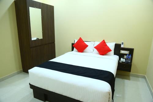 Cama o camas de una habitación en Kalpana Residency