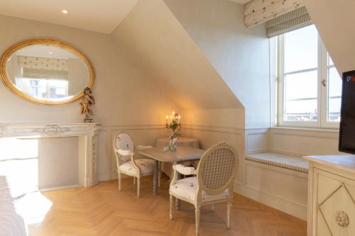 Ein Sitzbereich in der Unterkunft Guesthouse Mirabel