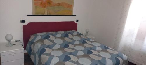 Ένα ή περισσότερα κρεβάτια σε δωμάτιο στο Cjase di Doro