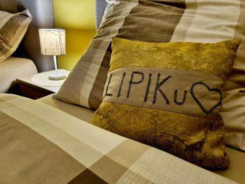 Postel nebo postele na pokoji v ubytování Sobe Lipik