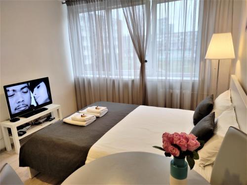 Llit o llits en una habitació de Klaipeda Akro Studio
