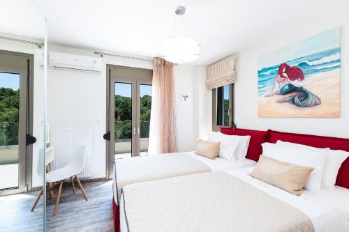 Ένα ή περισσότερα κρεβάτια σε δωμάτιο στο Luxury Cretan Villas with private pools