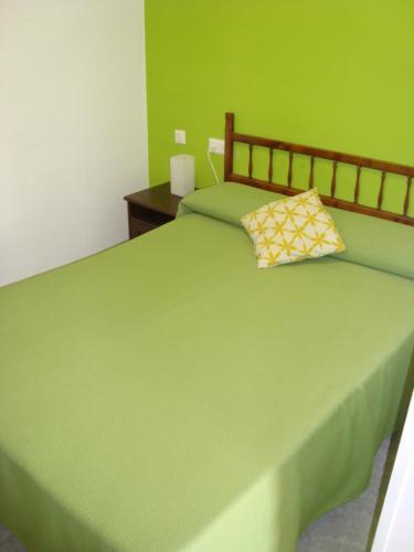 Posteľ alebo postele v izbe v ubytovaní Hostal Durán