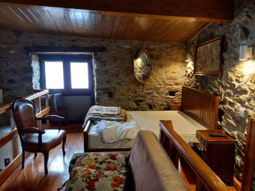 Ένα ή περισσότερα κρεβάτια σε δωμάτιο στο O Palheirinho - Turismo Rural - Bragança