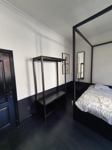 Postel nebo postele na pokoji v ubytování B96 suites